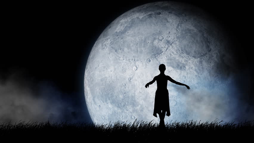 Portrait of professional dancer. Close up of beautiful female ballet dancer performing pirouettes on big full moon background with sky and clouds.