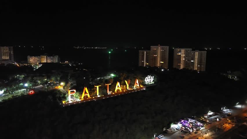 Night letters of Pattaya city. Symbol of nightlife. Drone footage Royalty-Free Stock Footage #1109685995