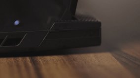 Side of laptop with ports and ventilation holes - Powered by Shutterstock - Get 15% off with code: PIKWIZARD15