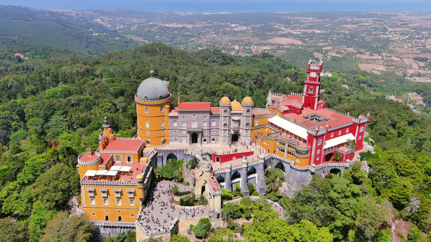 Sintra, Portugal: Aerial view of picturesque castle Pena Palace (Palácio da Pena) - landscape panorama of Europe from above Royalty-Free Stock Footage #1109700499