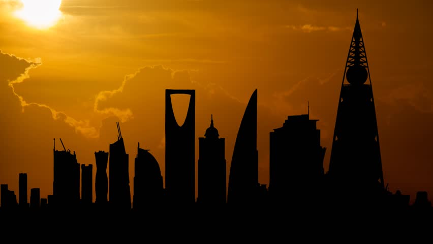 Saudi Arabia: Riyadh Kingdom Tower at Sunset, Time Lapse with Red Sun and Fiery Sky Royalty-Free Stock Footage #1109705453