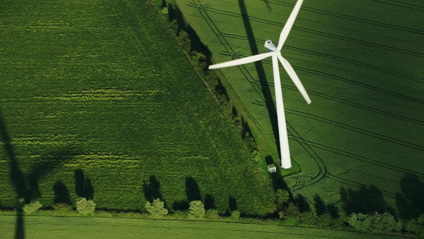 Green energy, wind turbines produce energy in the green field, modern power plant, alternative energy sources, quadrocopter flight. Royalty-Free Stock Footage #1109707787