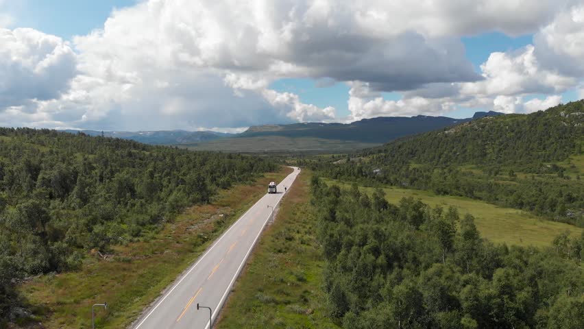 Aerial View Of Concrete Mixer Truck Driving Through The Road In Setesdal, Agder, Norway. Royalty-Free Stock Footage #1109713103