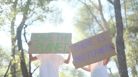 Sunny day in the forest, children with signs protesting climate change. Advocating for a sustainable, pollution-free future. Eco-conscious childhood, nature respect, environmental awareness in kids

 - Powered by Shutterstock - Get 15% off with code: PIKWIZARD15