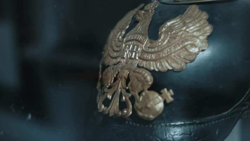 Close up Old German peaked helm WWI so called Pickelhaube exposed in museum. 2023, Museum of History, Chisinau, Moldova Royalty-Free Stock Footage #1109727259