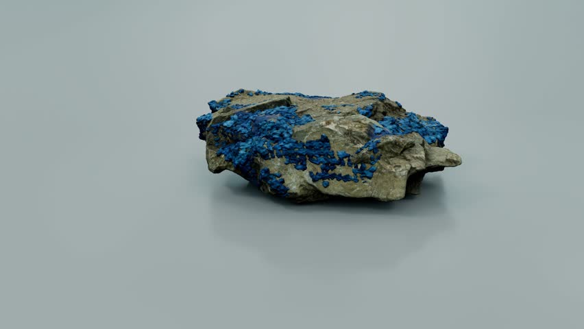 Raw Cobalt mineral displayed against a plain background. Royalty-Free Stock Footage #1109734447
