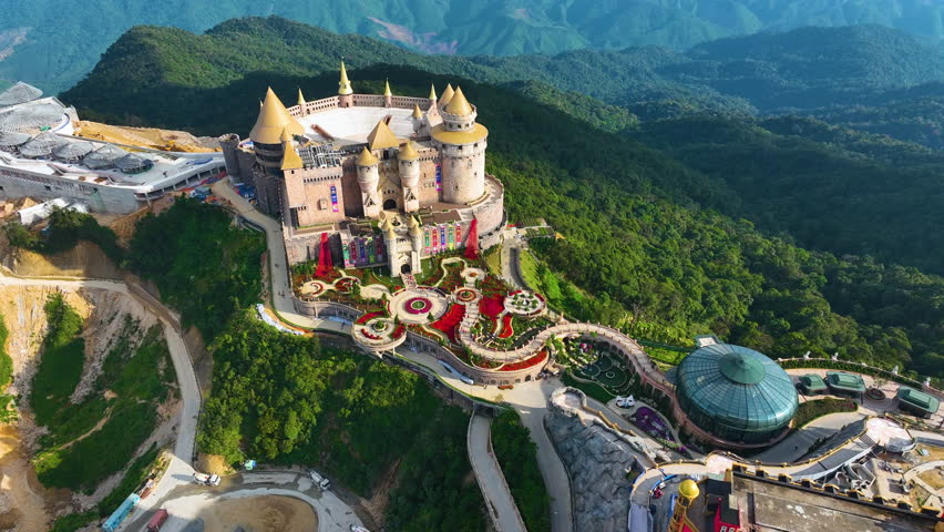 Aerial view of Ba Na Hills, lunar castles and French village with beautiful castles buildings, streets and campuses at the famous tourist destination of Da Nang, Vietnam. Near Golden bridge.