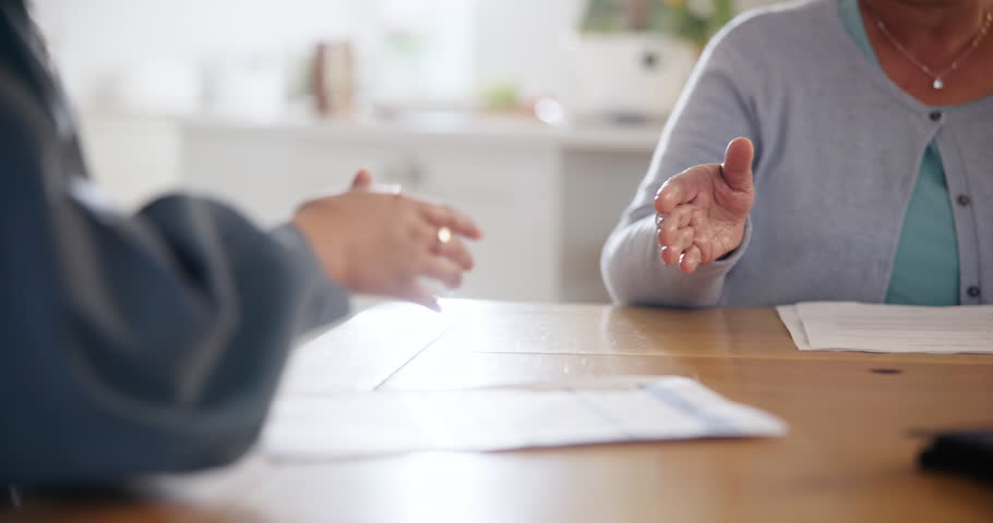 Handshake, deal and an insurance agent with a senior person in the home for finance or retirement planning. Thank you, contract and people shaking hands closeup for an investment or savings agreement Royalty-Free Stock Footage #1109748767