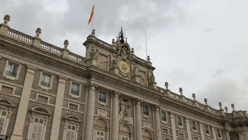 Hyper lapse shot of Royal Palace of Madrid, showcasing its historic architecture and Baroque and Classicism styles.