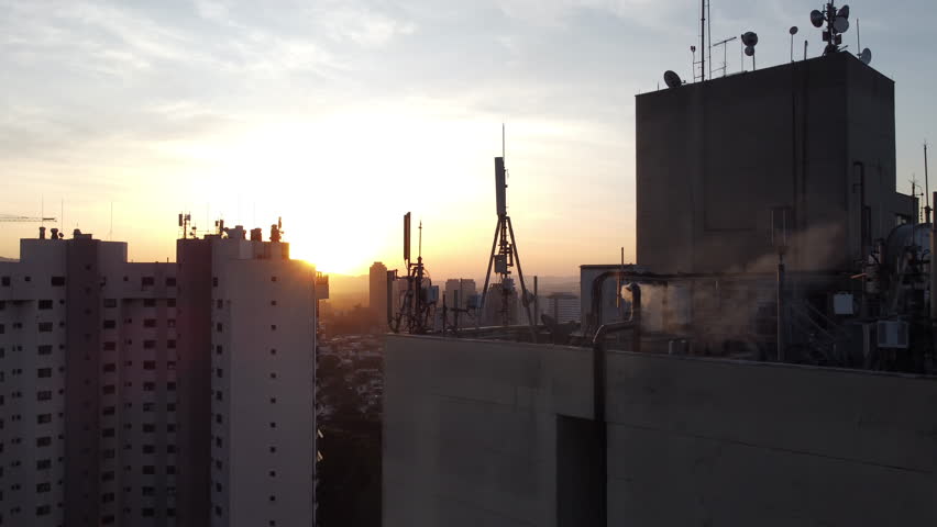 Flying By Communication Antenna On Top Of a Building