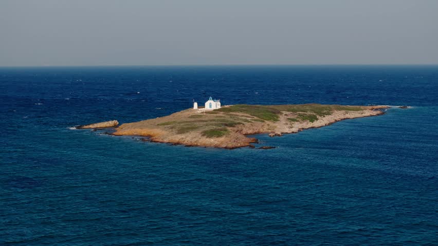 Small orthodox church on a small island in Vravrona, Greece