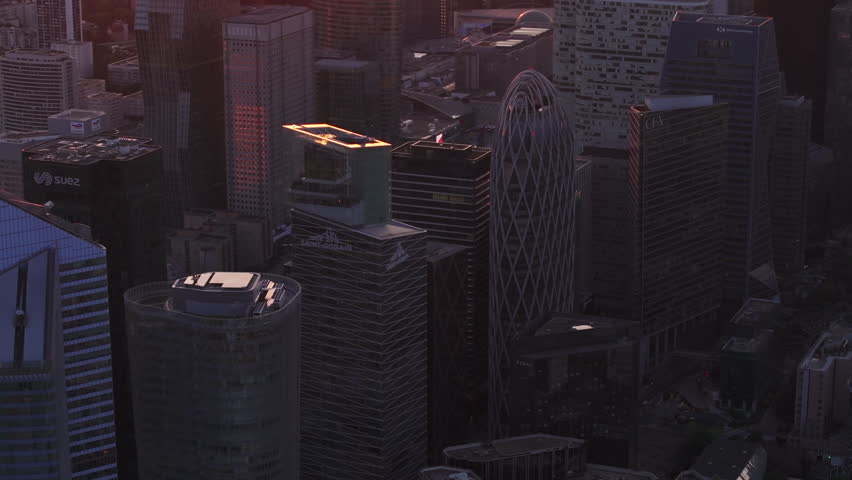 Group of modern high rise office buildings in futuristic La Defense business borough at sunset. Paris, France Royalty-Free Stock Footage #1109775761