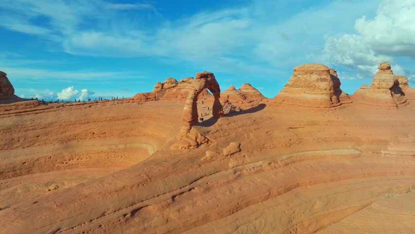 Several Tourist Excursion Over Red Rock Wonderland At Arches National Park, Utah, United States. Aerial Drone Shot
