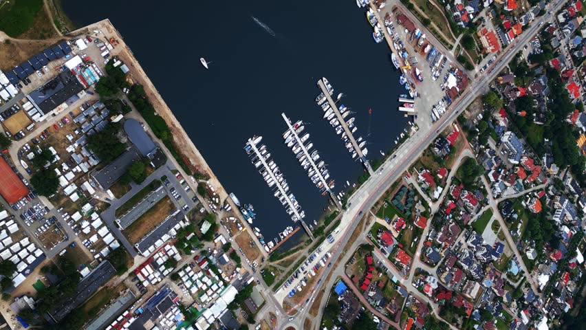 port and harbor with yachts and ships, Polish village Jastarnia, aerial 4k view