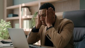 Upset stressed African American man negative emotion fail business project with laptop desperate businessman office worker investor take off glasses work crisis bankruptcy worry failure loss finance - Powered by Shutterstock - Get 15% off with code: PIKWIZARD15