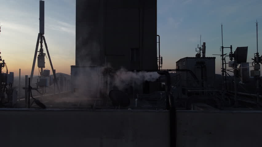 Flying By Communication Antenna On Top Of a Building