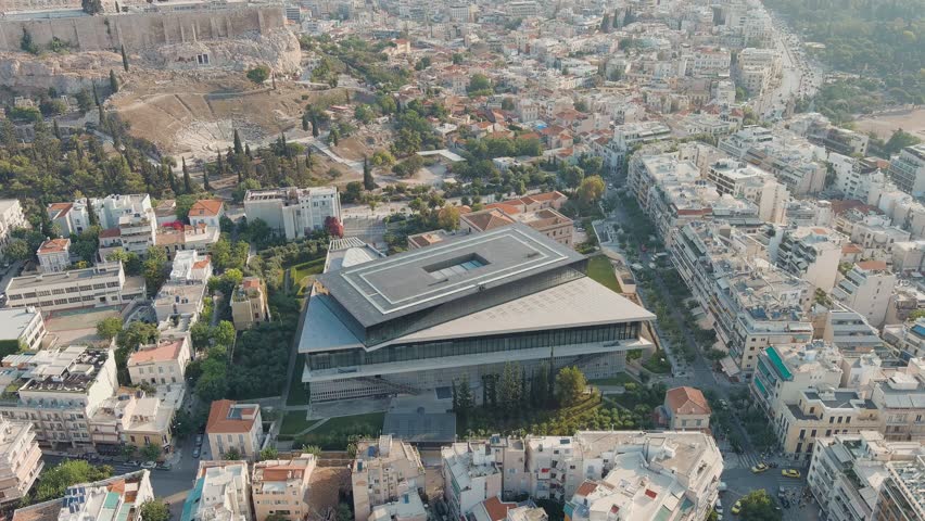 Athens, Greece. Acropolis Museum in the light of the morning sun. Summer, Aerial View, Point of interest Royalty-Free Stock Footage #1109784971