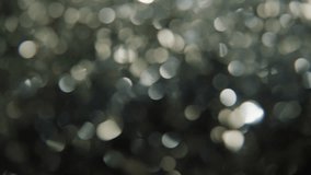 The Magic of the Holidays. 4K Slow-Motion Footage of Festive Foil Tinsel in Close-up. The Essence of Holiday Joy and Celebration. Glimmering Strand Radiates the Magic and Warmth of Family Gatherings - Powered by Shutterstock - Get 15% off with code: PIKWIZARD15