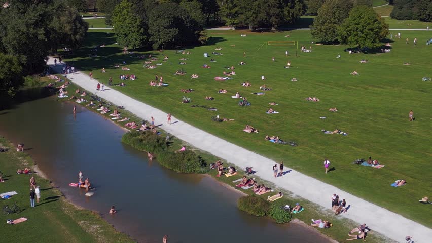 Dramatic aerial view flight drone summer English Garden Munich Germany Bavarian Royalty-Free Stock Footage #1109800543