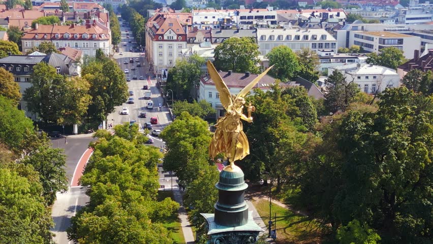 Fabulous aerial view flight drone Gold Angel of Peace column City town Munich