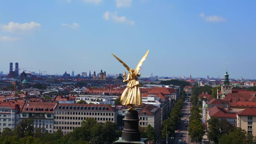 Majestic aerial view flight drone Gold Angel of Peace column City town Munich Royalty-Free Stock Footage #1109800557