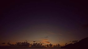 

time lapse Clouds filled the sky.
the sun down in horizon at beautiful sunset
Nature video High quality footage. 
Scene of Colorful romantic sky sunset with cloud moving in sky background.