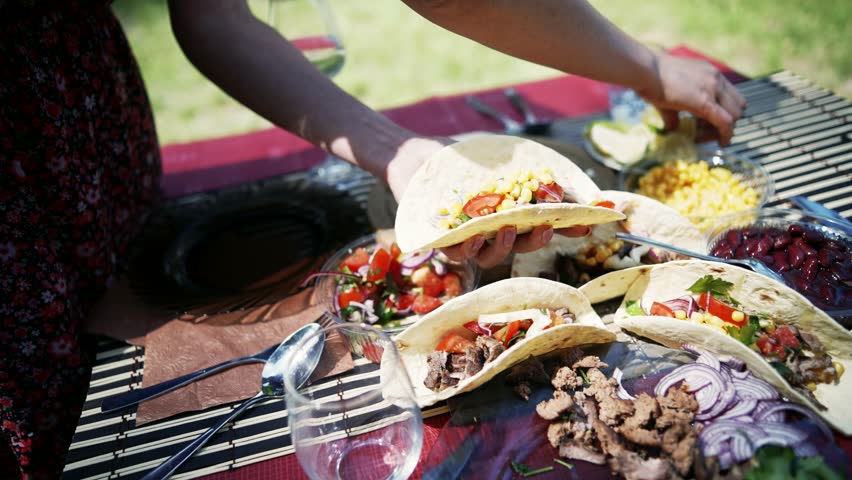 Tasty Mexican Tacos Filled Meat. Homemade American Soft Shell Beef Tacos. Mexican Food Burrito. Tortilla Fast Food. Mexican Pork Carnitas Tacos Fajitas. American Taco Salsa Corn Tortilla Carne Asada Royalty-Free Stock Footage #1109809345