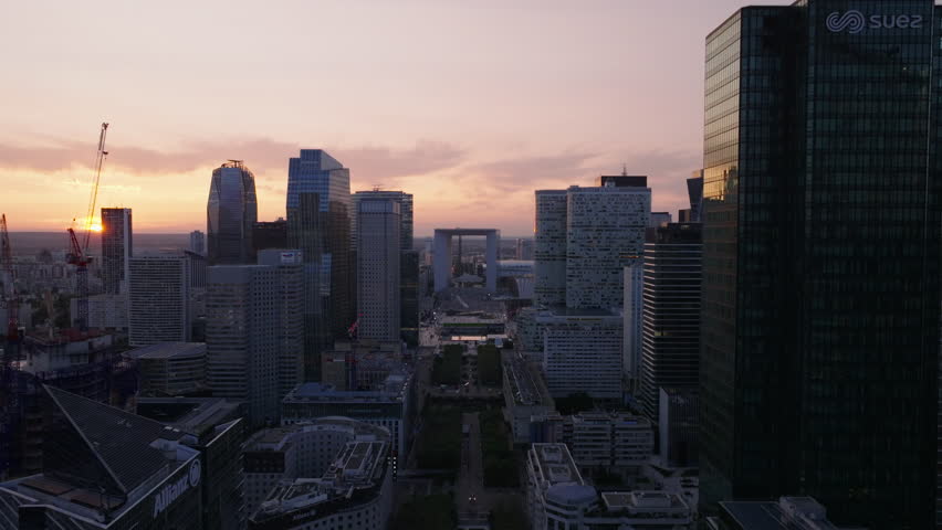 Rows of modern high rise office buildings in business district. La Defense borough against sunset sky. Paris, France Royalty-Free Stock Footage #1109813573