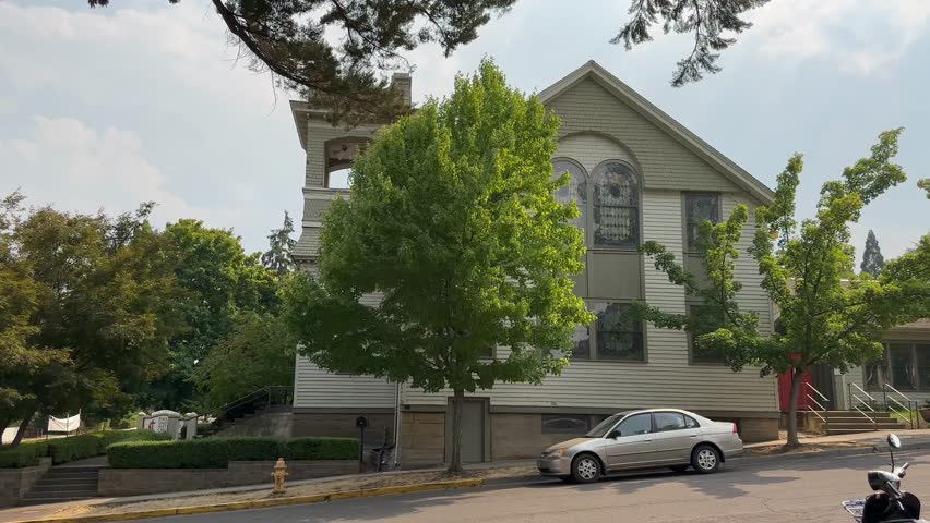 White wood exterior of the First United Methodist Church in Ashland, Oregon.