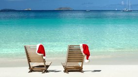 Christmas chairs on tropical beach in the Caribbean HD video christmas concept.

