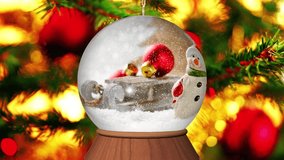 Christmas Snow Globe with Snow Falling and snowman in Motion and christmas lights in the Background - HD video.
