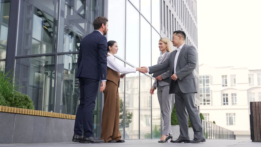 B2B meeting of business people handshake partners welcome, partnership and hiring contract success deal or networking. Trust, support and collaboration worker shaking hands for corporate interview - Powered by Shutterstock - Get 15% off with code: PIKWIZARD15