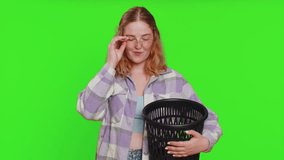 Redhead woman taking off throwing out glasses into bin after medical vision laser treatment therapy surgery looking smiling at camera, heal, cure. Pretty girl isolated on green chroma key background - Powered by Shutterstock - Get 15% off with code: PIKWIZARD15