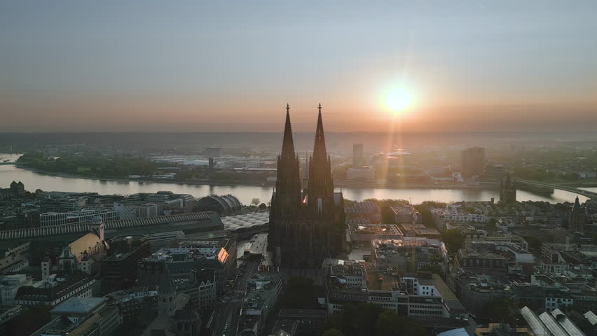 Cologne cathedral drone aerial view fly over cologne dome at sunrise, cologne city skyline germany. Royalty-Free Stock Footage #1109818381