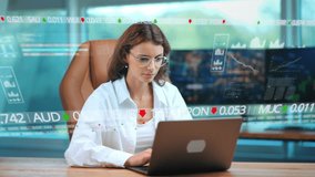 Business Woman working concentrated on laptop in modern office with digital graphs stock market financial data as overlay inserts - Powered by Shutterstock - Get 15% off with code: PIKWIZARD15