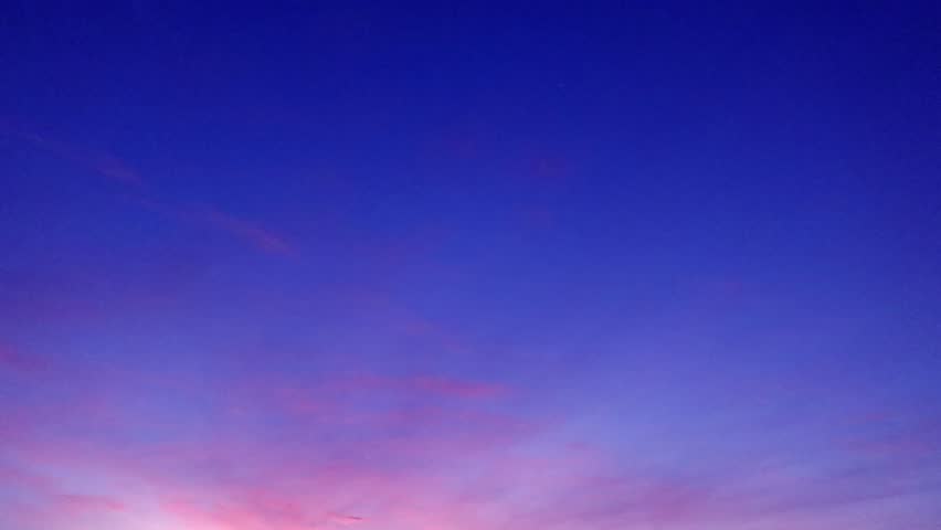 Colorful sunrise or sunset purple blue sky with beautiful pastel red pink cloud n orange yellow airy cloudscape in tropical summer or spring sunlight n bright sun ray, Slow n Stop motion 4k TimeLapse 