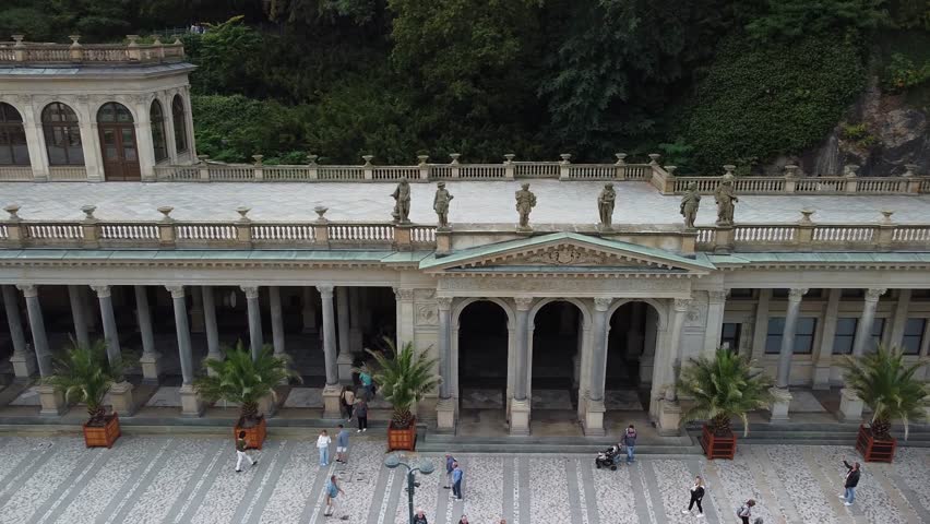 Healing springs in Karlovy Vary, embankment, bloom, sunrise, central alley, drone view