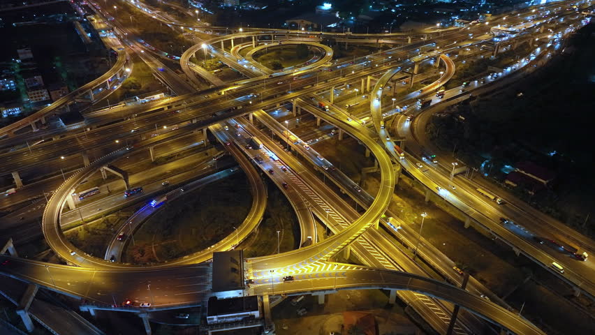 Aerial view of interchange and motorway road. transportation concept. night traffic time lapse. hyperlapse. Bangkok, Thailand	 Royalty-Free Stock Footage #1109852495