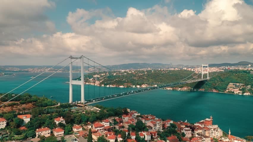 Aerial cinematic view Bosphorus Bridge, Fatih Sultan Mehmet Bridge. Istanbul, Turkey.