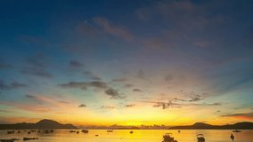 
Time lapse amazing yellow Light through the sky above the islands. 
Beautiful sunrise are accompanied by soft clouds floating in stunning sky.
Beautiful sunrise soft clouds floating above the sea.