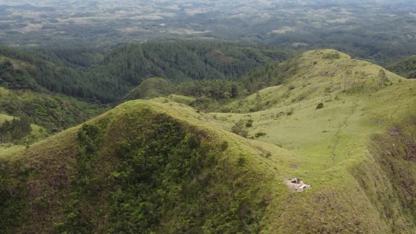 Mountain top with fog over it