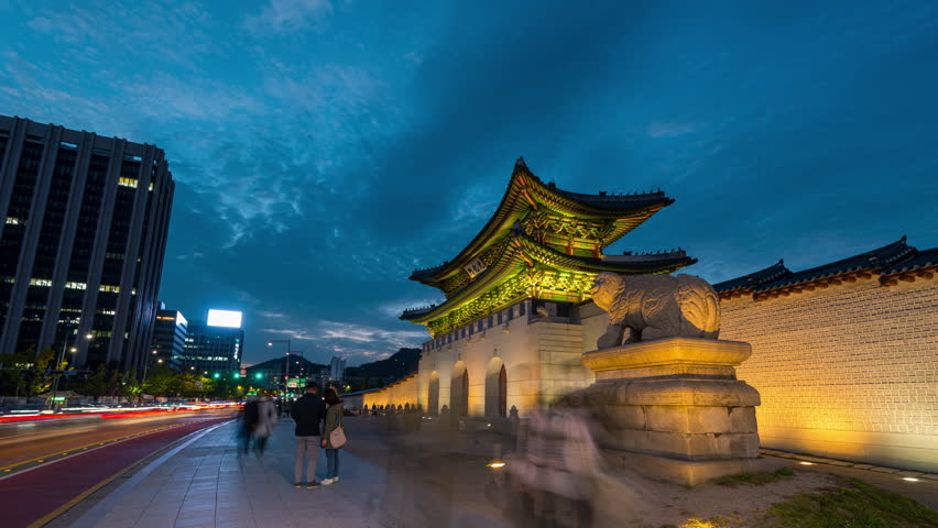 Hyperlapse, Gwanghwamun gate at night in Seoul city South Korea.The translation of the Chinese characters is"gwanghwamun gate"