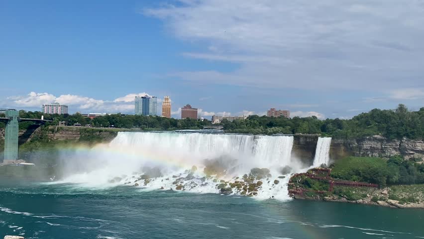 A rainbow in front of American and Bridal Veil Falls in Niagara Falls.