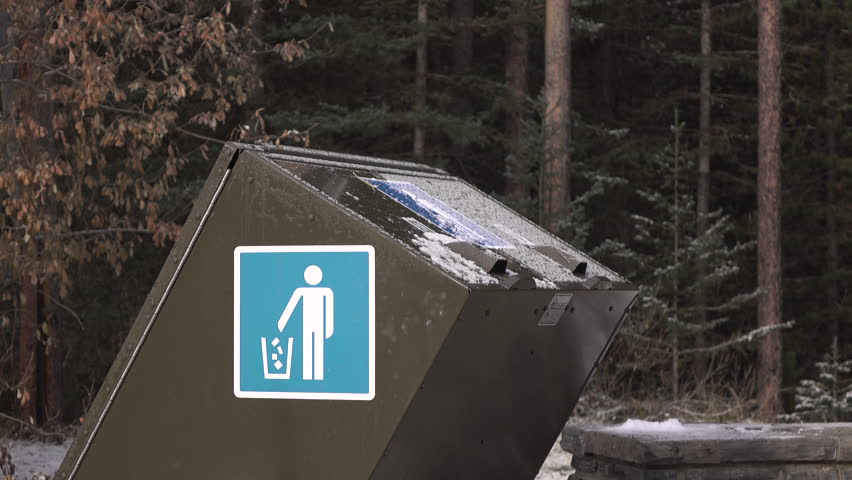 Throwing away trash into bin on nature trail 4k
 Royalty-Free Stock Footage #1109895785