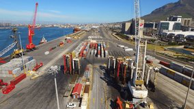 Shipping, commercial container and drone by road for export, industrial trade and logistics or international cargo. Freight transportation, supply chain and aerial view of business or city background - Powered by Shutterstock - Get 15% off with code: PIKWIZARD15