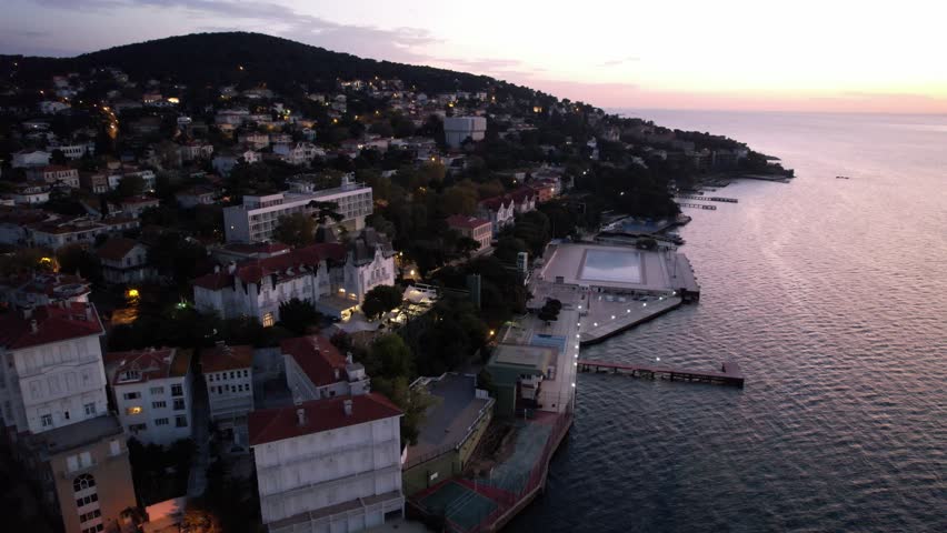 Aerial view of Buyukada (Princes Islands) in Istanbul at sunset. Istanbul, Turkey. Buyukada is the largest of the Princes Islands. Drone shot. Royalty-Free Stock Footage #1109896849