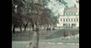 Historical building, park with green trees, panorama. Archive, Odessa, Ukraine summer 1960s