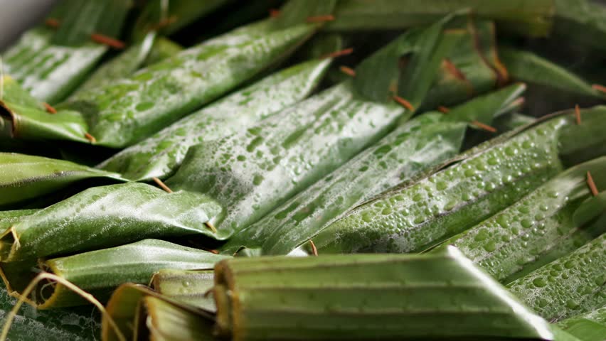 Steamed Pepes ( PEPES IKAN) , a traditional Indonesian food. The fish is seasoned with spicy spices and then wrapped in banana leaves.