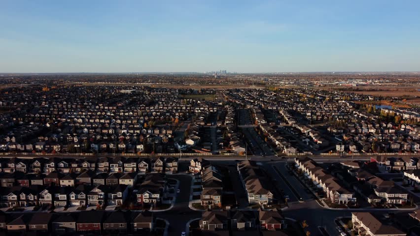 An aerial shot of Calgary Downtown in the far background with the Silverado community in the foreground.