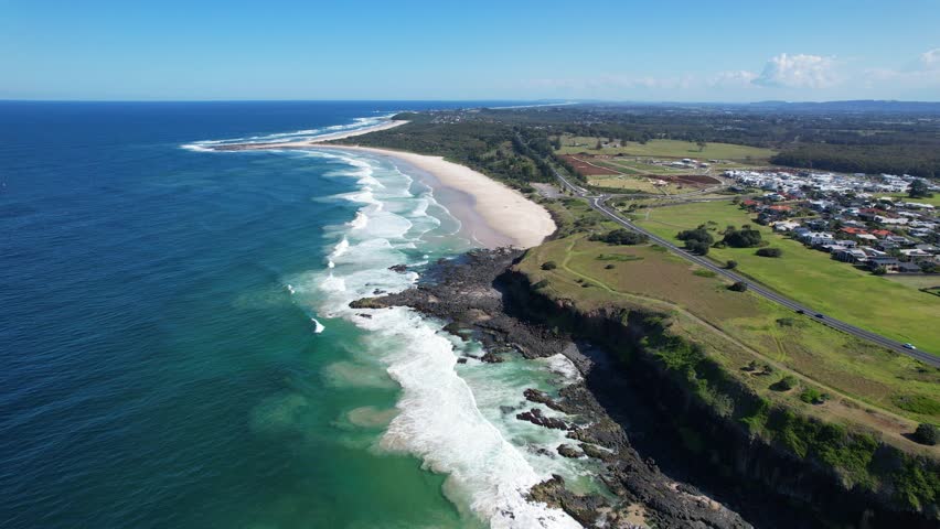 White's Head At The Northern End Of Sharpes Beach Near Ballina In New South Wales, Australia. aerial Royalty-Free Stock Footage #1109913107